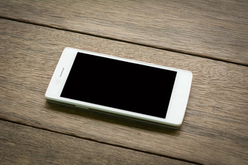 Mobile white on a wooden floor.