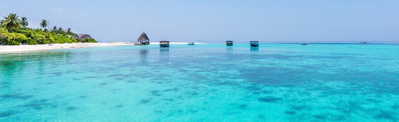 Panorama of tropical lagoon on the island in Indian Ocean. Maldives.