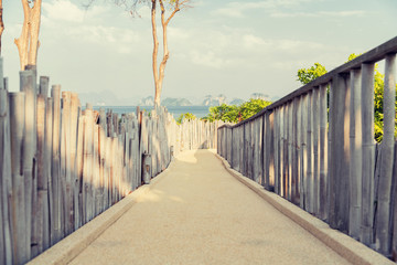 road with fence at seaside