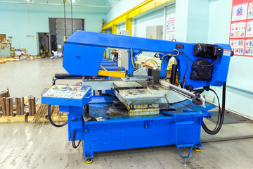 Semi-auto band saw in mechanical workshop