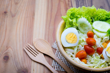 salad in a wood bowl