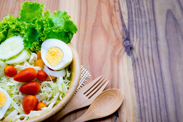 salad in a wood bowl