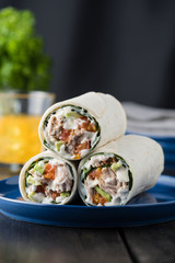 Tuna burritos with avocado tomato and mayonnaise