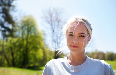 happy young volunteer woman outdoors