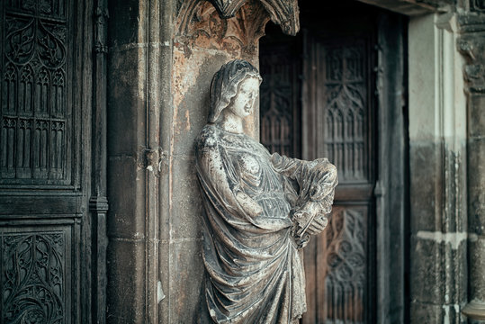 Mary Sculpture at the entrance to basilica of St. John the Baptist, Chaumont