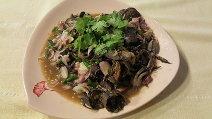 Fresh local crab spicy salad on white plate.
