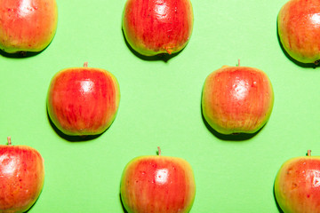 Colorful fruit pattern made of ripe red apples
