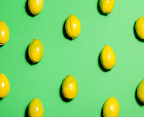 Colorful fruit pattern made of ripe green olives
