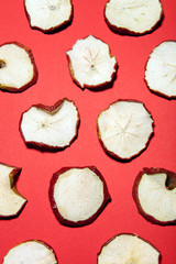 Colorful fruit pattern made of dried apples slices