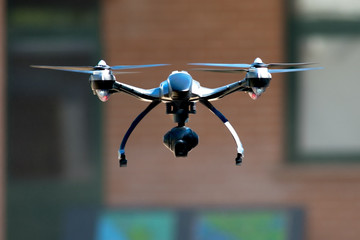 drone flying near house - obrazy, fototapety, plakaty