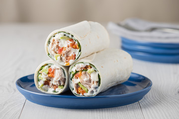 Tuna wraps with avocado tomato and mayonnaise