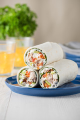 Tuna wraps with avocado tomato and mayonnaise