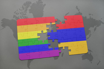 puzzle with the national flag of armenia and gay rainbow flag on a world map background.