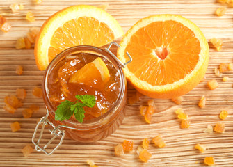  orange jam on wooden background