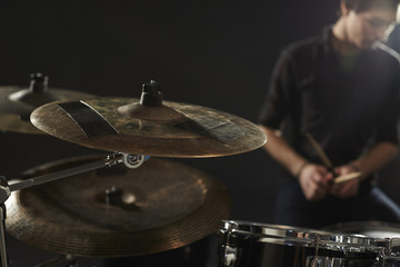 Fototapeta na wymiar Close Up Of Cymbals On Drummer's Drum Kit