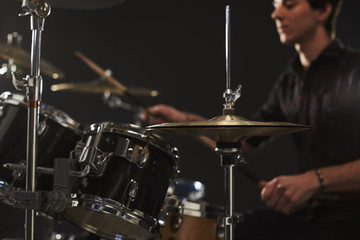 Fototapeta na wymiar Close Up Of High Hat Cymbals On Drummer's Drum Kit