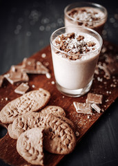 Cup with hot chocolate and chocolate chip cookies. Sweet chocolate dessert. Top view point