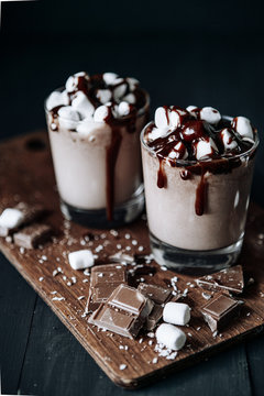 Homemade Hot Chocolate. A cup with hot chocolate, marshmallows and bar chocolate.