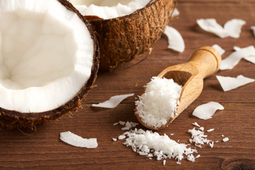 grated coconut on wooden background