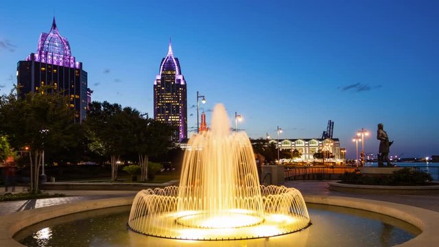 Downtown Mobile, Alabama Skyline & Water Fountain at Night - Time Lapse