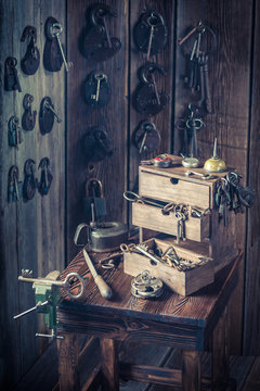 Locksmiths workshop with tools, locks and keys