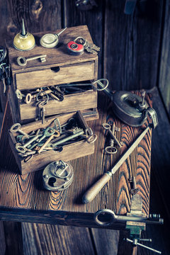 Vintage locksmiths workshop with tools to repair