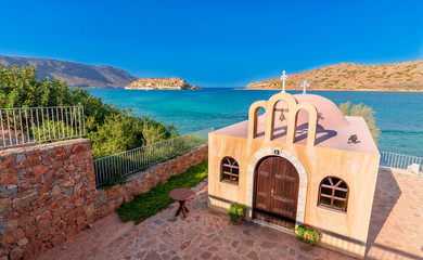 A church in Plaka in front of Spinalonga, the lepers island.