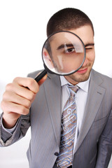 Obraz na płótnie Canvas man with magnifying glass