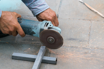 Professional technicians are grinding, grinding steel