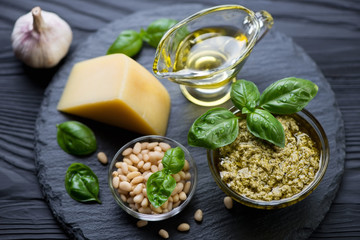 Close-up of ingredients for preparing basil pesto sauce