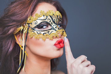 Sexy woman with carnival mask