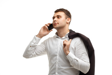Handsome businessman talking phone isolated