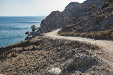 The road on the hillside near the sea.