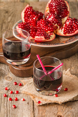 Ripe pomegranates with juice 