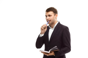 Handsome businessman with diary