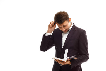 Handsome businessman with diary