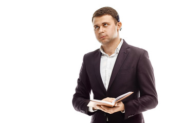 Handsome businessman with diary