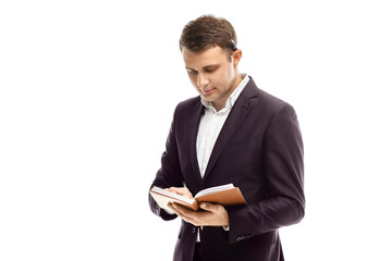 Handsome businessman with diary