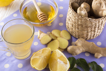 Cup of Ginger tea with lemon and honey.