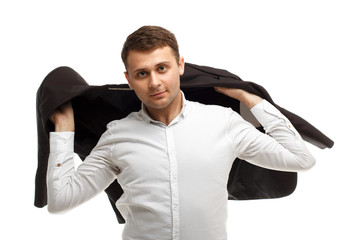 Handsome businessman throws jacket