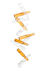 falling ampoules isolated on a white background