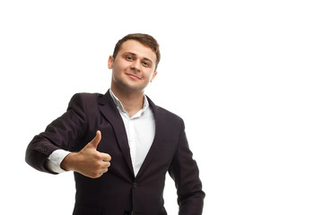 Handsome businessman showing thumb up