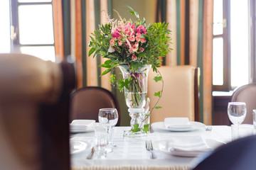 Flora on the holiday table. Bouquet of wildflowers.