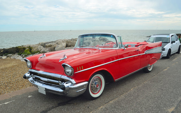Classic Red convertible on show on Felixstowe seafront.