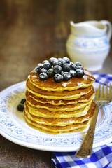 Pancakes with honey and blueberry.Top view.