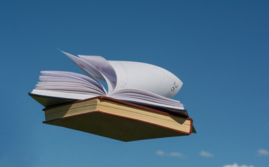 Flying books in sky