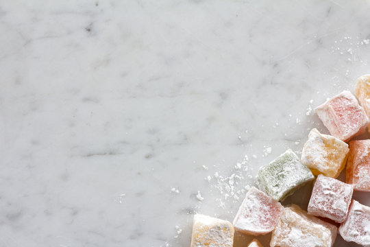 Turkish Delight from Above on Marble Board with Copy Space
