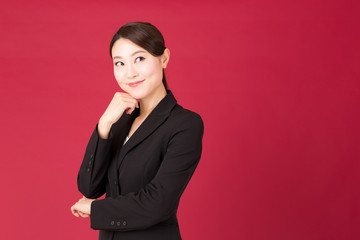 asian businesswoman isolated on red background