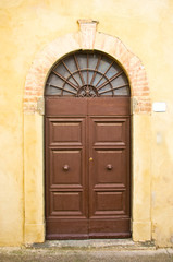 Fototapeta na wymiar ancient wooden door of historic building