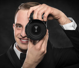 Photographer with camera.